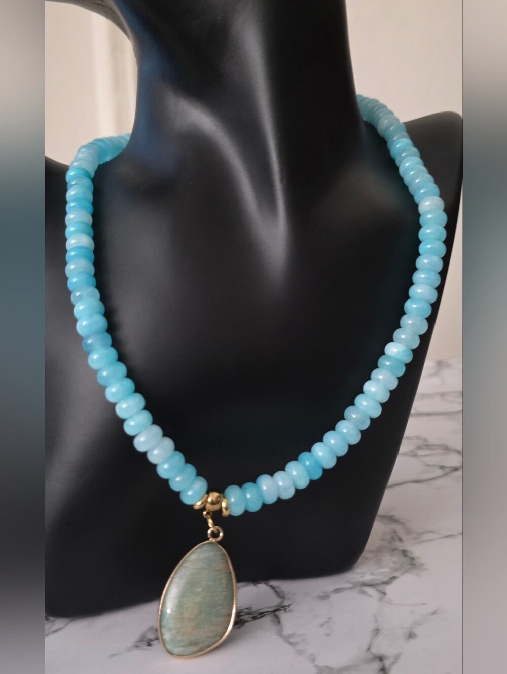 Light Blue Beaded Necklace with Stone Pendant